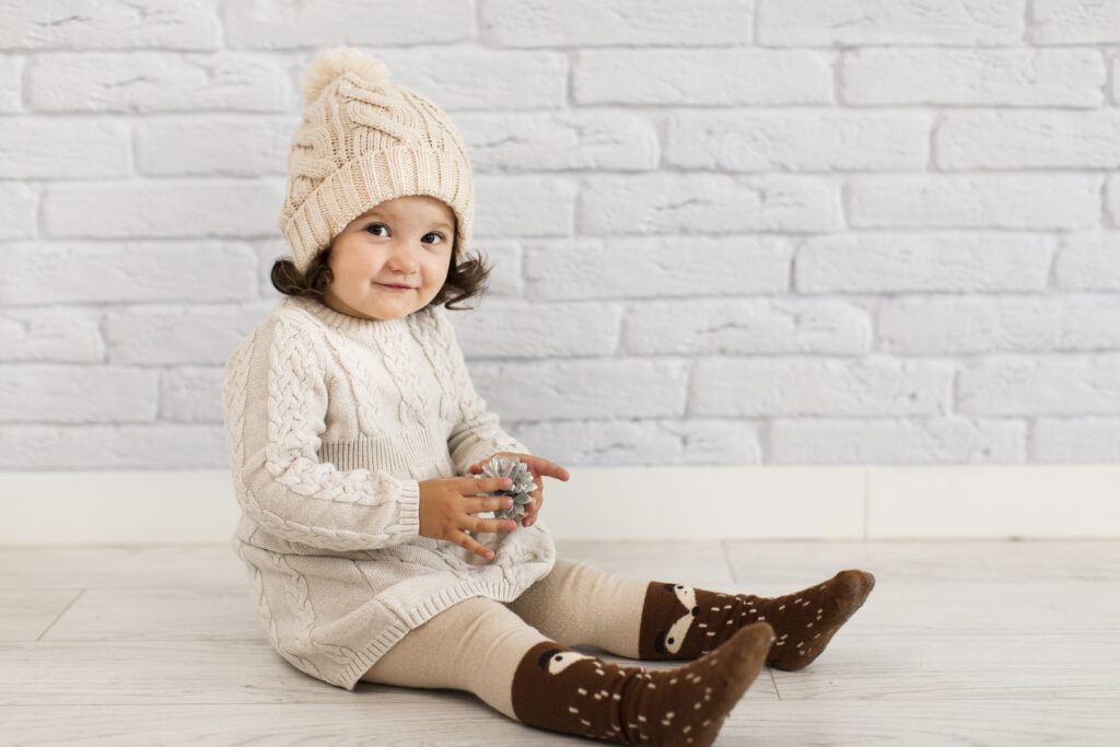 baby all layerd up to keep warm 