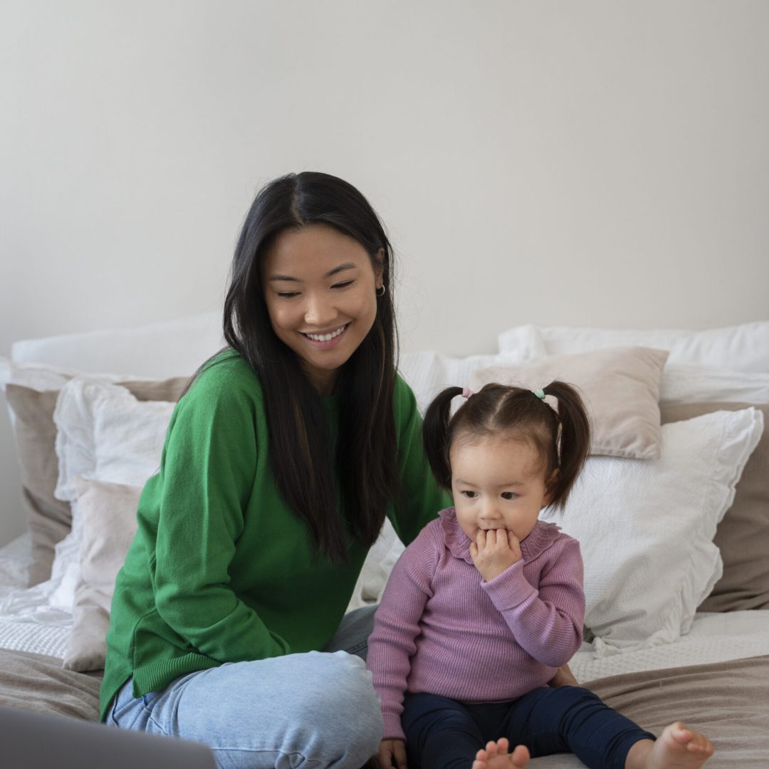 little-asian-girl-spending-time-home-with-her-mother